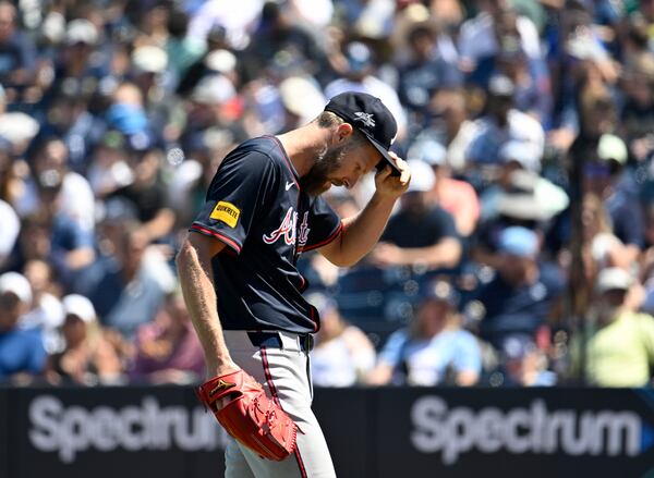 Braves pitcher Chris Sale reacts after giving up an RBI single against the Rays on Sunday.