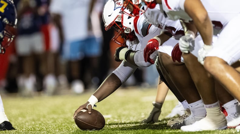Sandy Creek players line up in formationduring the first half against Douglas County at Douglas County High School in Douglasville, GA on Friday, August 28, 2026. (Oscar Guevara Saenz for the AJC)