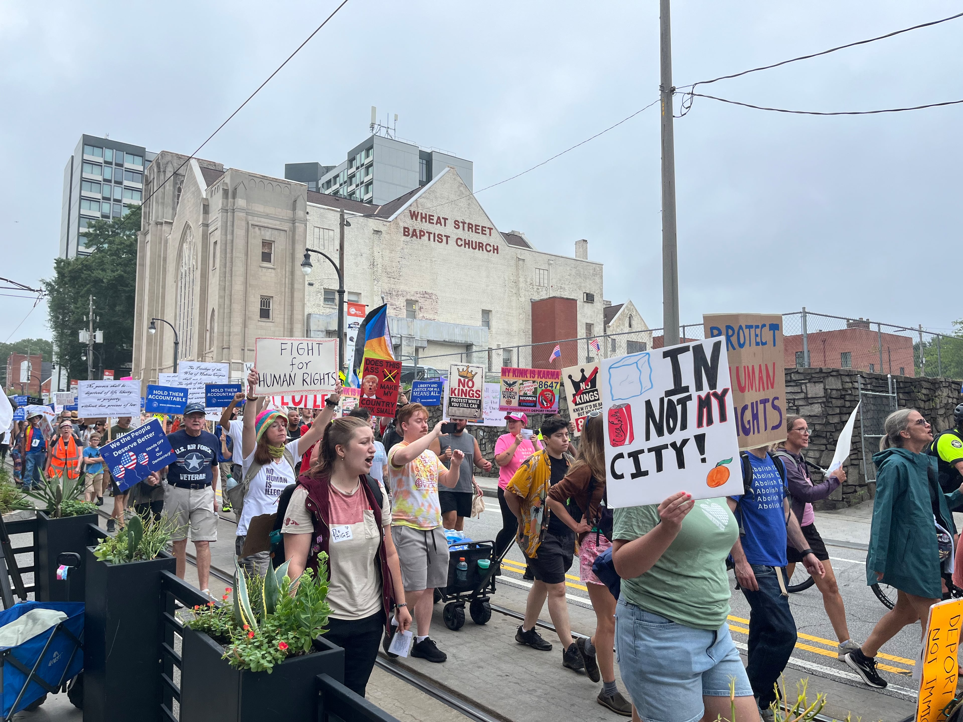 Demonstrators marched from the King Center to the Immigration and Customs Enforcement field office in Atlanta on Saturday to protest Trump administration policies.