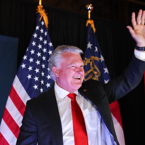 Republican U.S. Senate candidate Mike Collins walks out to speak at his primary election watch party in Jackson on May 19, 2026. (Arvin Temkar/AJC)