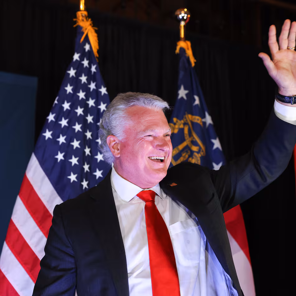 Republican U.S. Senate candidate Mike Collins walks out to speak at his primary election watch party in Jackson on Tuesday, May 19, 2026. (Arvin Temkar/AJC)