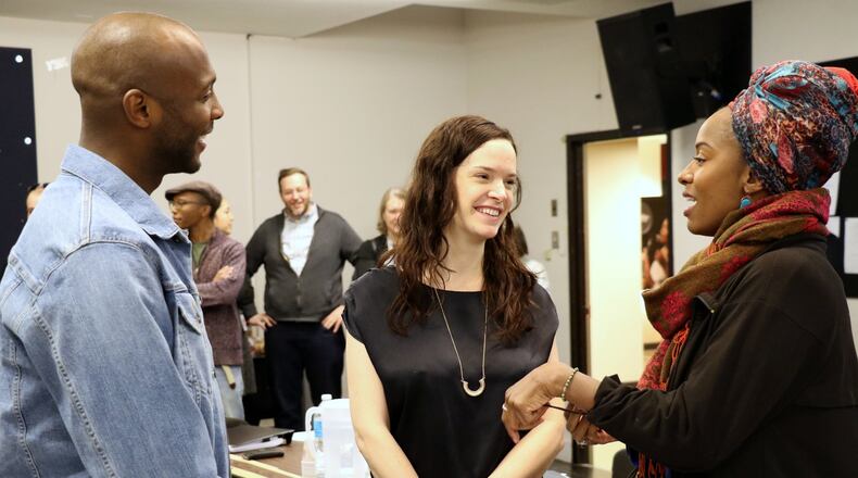 Playwright Jireh Breon Holder, director Margot Bordelon and actress Eboni Flowers on the first day of rehearsals for “Too Heavy for Your Pocket,” which will run at the Alliance Theatre through Feb. 26. CONTRIBUTED BY ARIEL TINTER