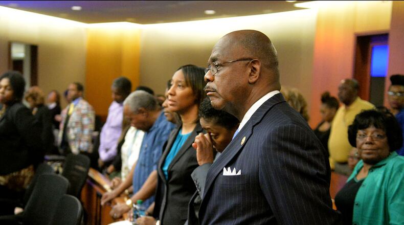 Fulton County District Attorney Paul Howard stands as the jury comes back into the courtroom before Senior Assistant DA Clint Rucker gives the state's final arguments Wednesday afternoon. The courtroom was packed to capacity for the final closing arguments in the Atlanta Public Schools test-cheating trial. (Atlanta Journal-Constitution, Kent D. Johnson, Pool)