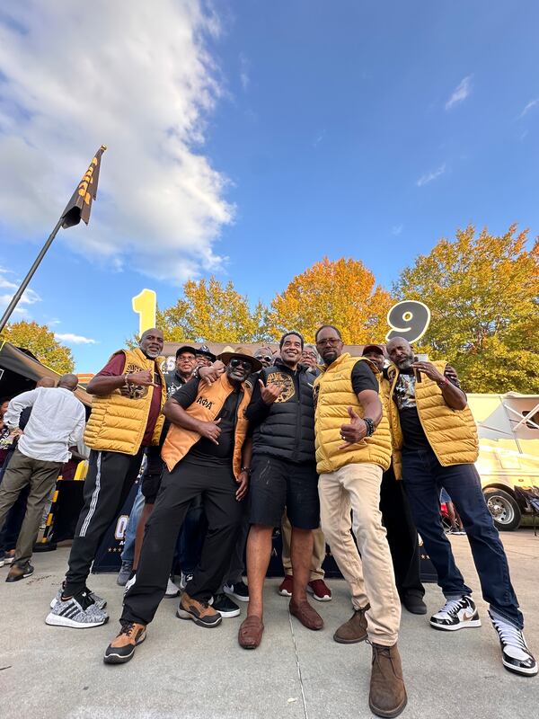 Brothers from the Gamma Beta Chapter of Alpha Phi Alpha gather at N.C. Central University's 2024 homecoming. (Ernie Suggs/AJC)