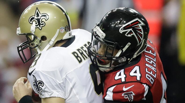Vic Beasley (44) returned to the game and recorded a sack of New Orleans Saints quarterback Drew Brees (9) on the final play of the first half Sunday, Jan. 1, 2017, in Atlanta.