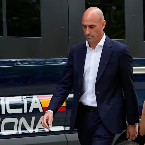 FILE - The former president of Spain's soccer federation Luis Rubiales passes a police van as he leaves after testifying at the National Court in Madrid, Spain,Sept. 15, 2023. (AP Photo/Manu Fernandez, File)