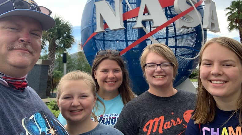Kelley Gaines, second from right, on a recent family trip. The longtime Hart County engineering and video production teacher loved her students and was a fan of space exploration, said her husband, Greg (left). CONTRIBUTED