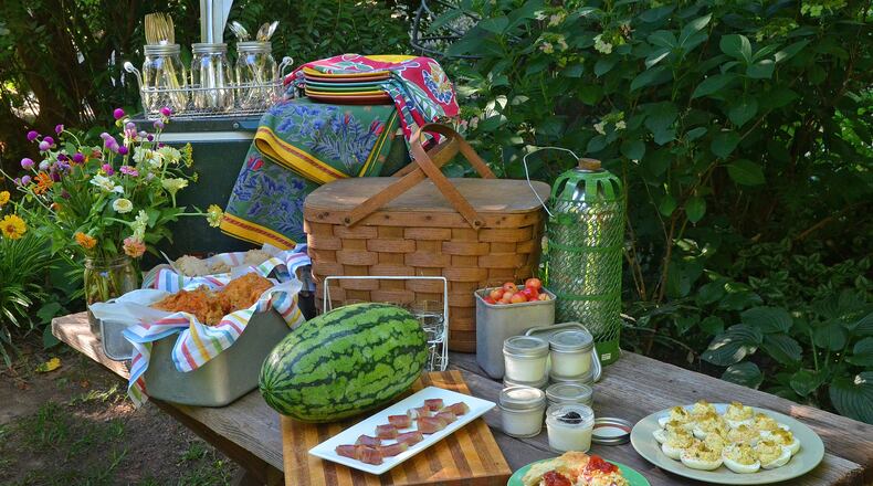 Summer is a popular time to take your food and dining outdoors. Stay safe by following the USDA’s food safety guidelines. CHRIS HUNT / SPECIAL