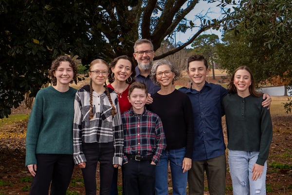 Comedian Ed Wiley, of Tifton, photographed with his wife Annie and their six kids on their farm. (Courtesy of Delaney Garcia)