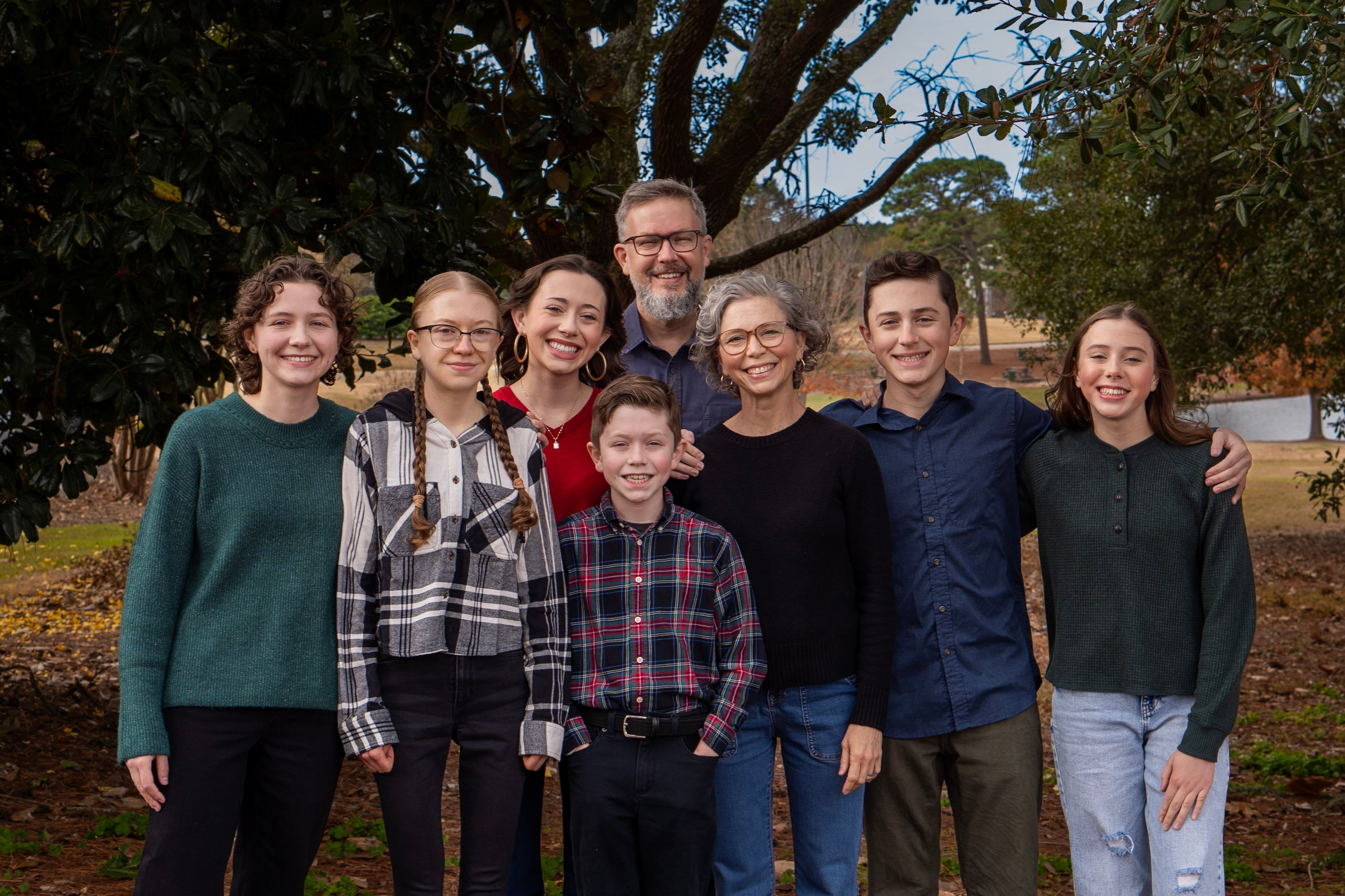 Comedian Ed Wiley, of Tifton, photographed with his wife Annie and their six kids on their farm. (Courtesy of Delaney Garcia)