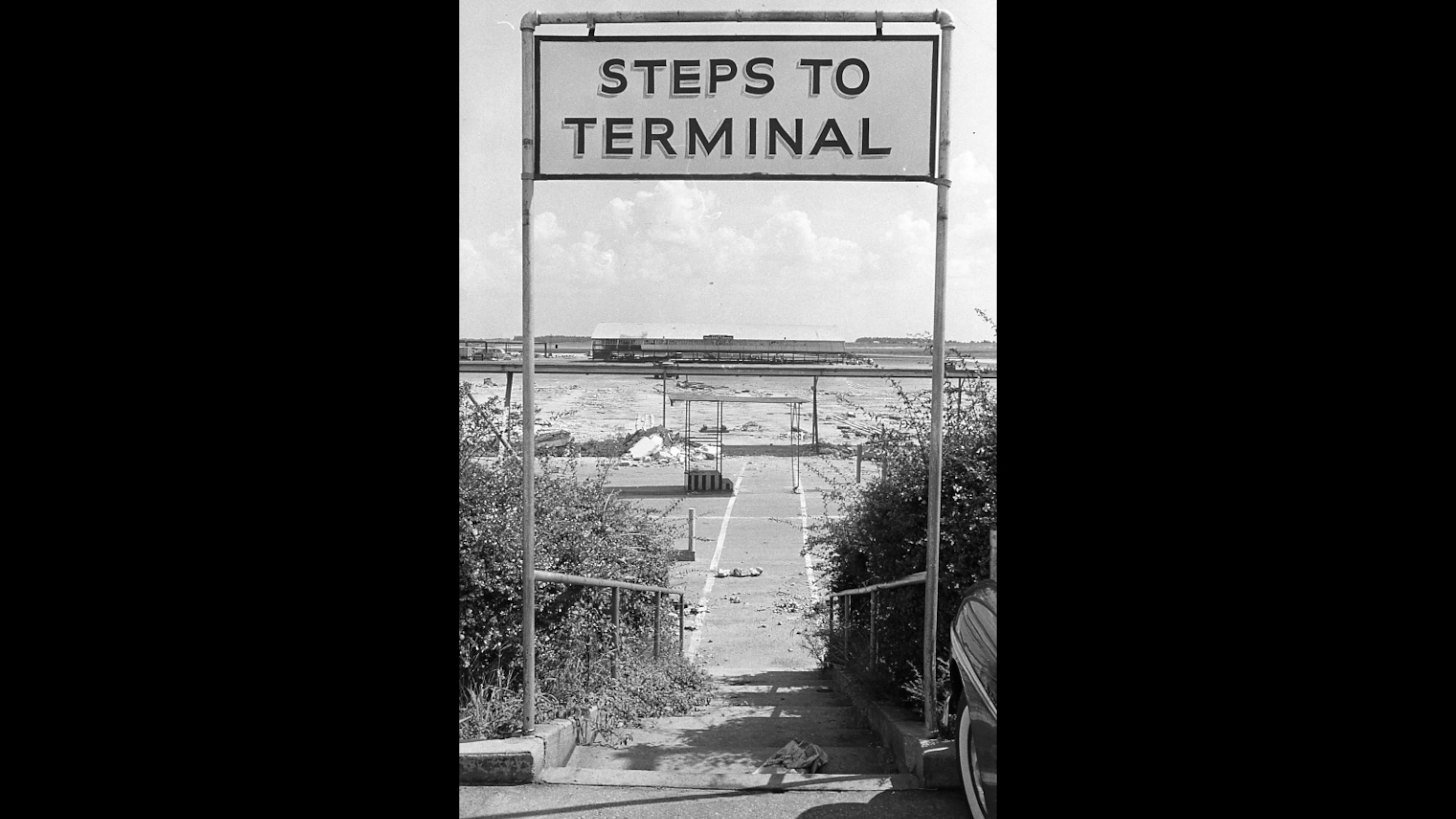 Steps to the old Airport terminal lead to nowhere. If you're looking for the terminal, it's wa-a-y in the background. (Dwight Ross Jr / AJC staff) 1961
