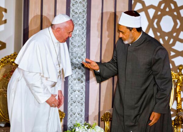 FILE - Sheikh Ahmed el-Tayeb, right, Grand Imam of Al-Azhar, the pre-eminent institute of Islamic learning in the Sunni Muslim world, right, welcomes Pope Francis at the international peace conference in Cairo, Egypt, Friday, April 28, 2017. (AP Photo/Amr Nabil, file)