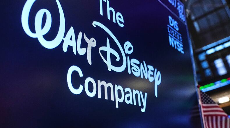 FILE - The logo for The Walt Disney Company is displayed above a trading post on the floor of the New York Stock Exchange, Monday, Feb. 2, 2026. (AP Photo/Richard Drew, File)