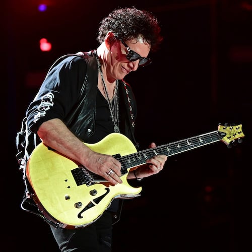 FILE - Neal Schon, of Journey, performs in Canton, Ohio, on Aug. 6, 2022. (AP Photo/David Dermer, File)