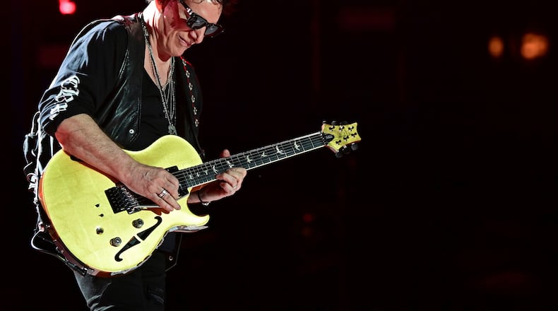 FILE - Neal Schon, of Journey, performs in Canton, Ohio, on Aug. 6, 2022. (AP Photo/David Dermer, File)