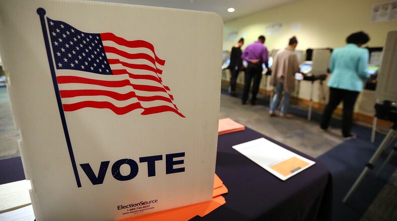 Early voters cast their ballots at the Buckhead Library on last week in Atlanta. Curtis Compton,ccompton@ajc.com