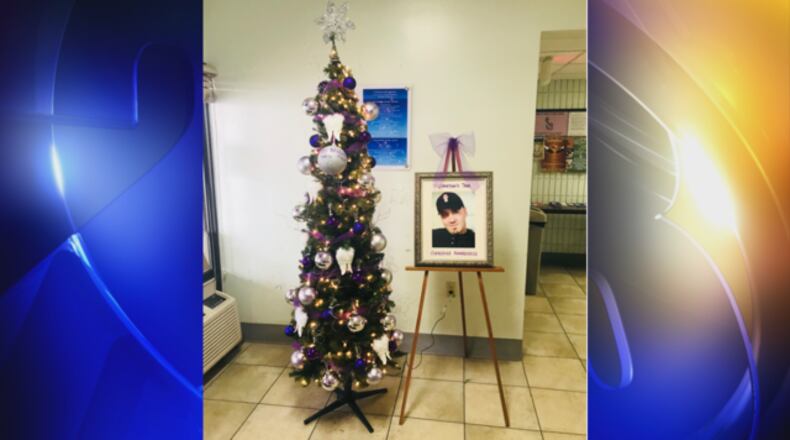 A tree serves as a memorial to a son who was killed by a drug overdose.
