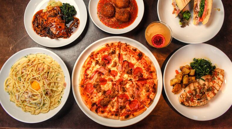 Toscano Ristorante Italiano at Atlantic Station in Midtown has a menu that includes (top row starting from left) Chicken Marsala, rice balls filled with mozzarella and beef, Hunny Pot (cocktail) and porchetta panini; (bottom row from left) Bucatini Carbonara, a meat lover's pizza and Grilled Swordfish. (Chris Hunt for The Atlanta Journal-Constitution)