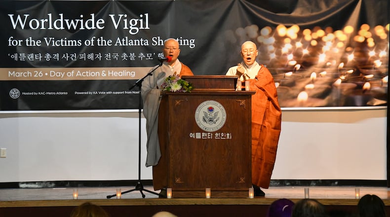 March 26, 2021 Norcross - Monks from Jun Dung Sa Buddhist temple join in prayer during Worldwide Vigil to remember the victims of the Atlanta area spa shootings at The Korean American Association of Greater Atlanta building in Norcross on Friday, March 26, 2021. The vigil was held to pay respects to the deceased, find communal healing and hope in the face of heightened violence that has traumatized the entire Asian American community, and call for solidarity under a banner of anti-racism. This vigil is part of numerous events taking place on March 26th, which has been promoted as the #StopAsianHate National Day of Action and Healing by Asian American Congressional leaders and civic organizations.  (Hyosub Shin / Hyosub.Shin@ajc.com)