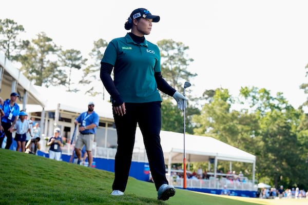 Ariya Jutanugarn, of Thailand, looks at her ball on the 18th green during the final round of the Chevron Championship LPGA golf tournament Sunday, April 27, 2025, in The Woodlands, Texas. (AP Photo/Ashley Landis)