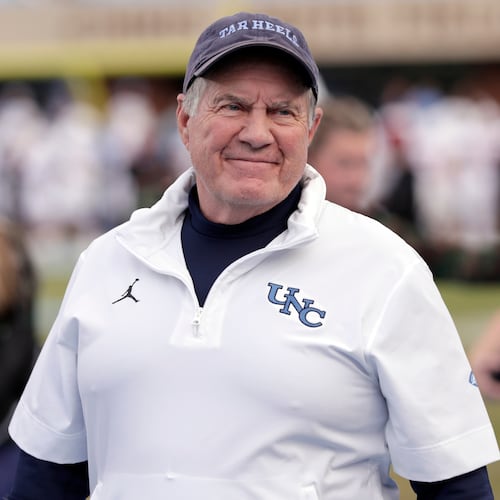 North Carolina head coach Bill Belichick smiles as he walks the sidelines before an NCAA college football game against Stanford, Saturday, Nov. 8, 2025, in Chapel Hill, N.C. (AP Photo/Chris Seward)