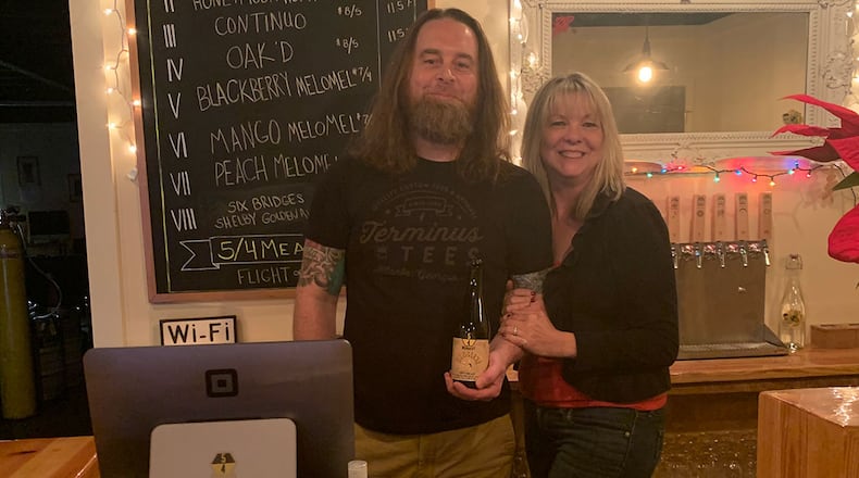 Sean and Lisa Walcek, the owners of 5/4 Meadery in Roswell. / Courtesy of Sean Walcek