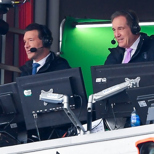 FILE - CBS broadcaster Tony Romo, left, calls the game during the second half of a NFL football wild card playoff game between the Buffalo Bills and the Denver Broncos in Orchard Park, N.Y., Jan. 12, 2025. (AP Photo/Adrian Kraus, File)