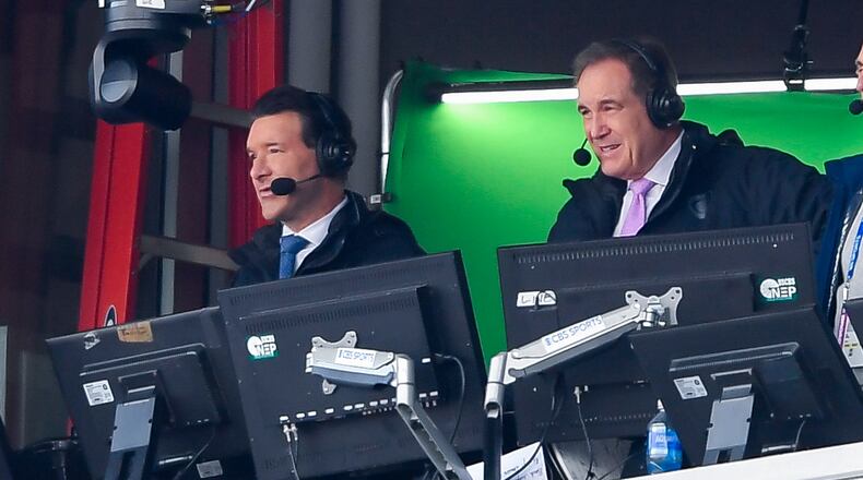 FILE - CBS broadcaster Tony Romo, left, calls the game during the second half of a NFL football wild card playoff game between the Buffalo Bills and the Denver Broncos in Orchard Park, N.Y., Jan. 12, 2025. (AP Photo/Adrian Kraus, File)