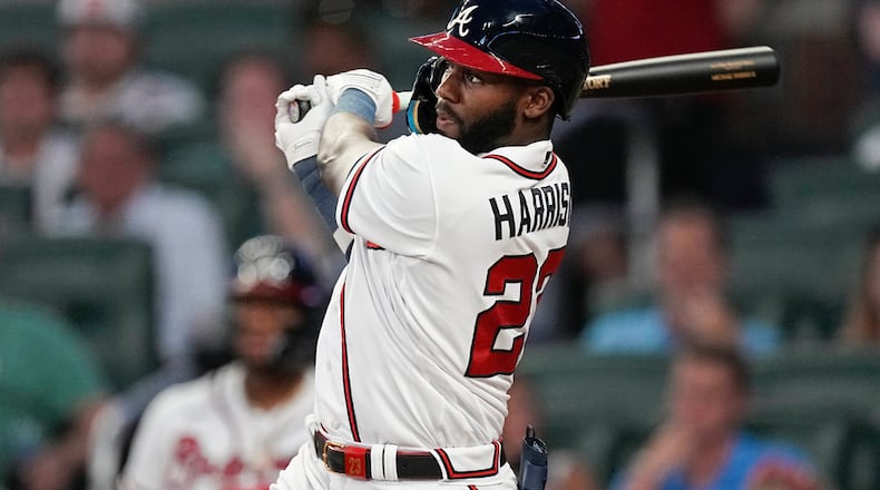 Atlanta Braves' Michael Harris II watches his solo home run in the fifth inning of a baseball game against the Los Angeles Angels, Tuesday, Aug. 1, 2023, in Atlanta. (AP Photo/John Bazemore)