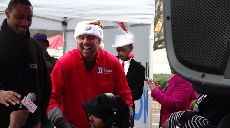 Crash Clark crashes his buddy Ryan Cameron's morning show. Clark lost his gig at V-103 on Dec. 16, 2014 but has since become an 11 Alive traffic reporter. CREDIT: Rodney Ho/rho@ajc.com