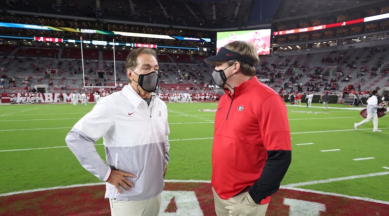 Alabama coach Nick Saban (left) and Georgia coach Kirby Smart meet before their teams play Oct. 17, 2020 at Bryant-Denny Stadium in Tuscaloosa, Ala. (Photo by University of Alabama)