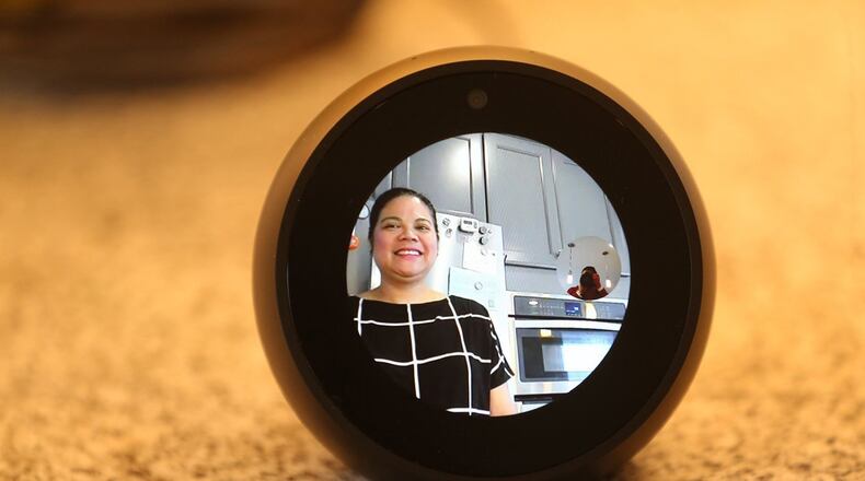Armida Rosales and her husband, Arnold, had not thought much about voice-activated technology in their new Maple Valley home, but Amazon’s Alexa was included and the family likes the convenience. Rosales is seen in an Echo “Spot” camera on June 12, 2018. (Greg Gilbert/Seattle Times/TNS)