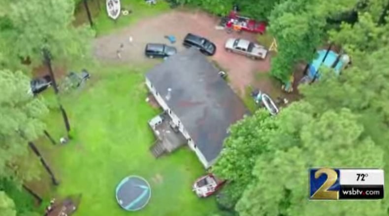 SWAT shot a man barricaded in a residence that authorities said shot his mom beforehand.