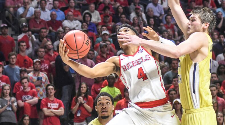 Mississippi guard Breein Tyree (4) shoots against Georgia Tech guard Tadric Jackson (1) and center Ben Lammers (44) during an NCAA college basketball game in the quarterfinals of the NIT on Tuesday, March 21, 2017, in Oxford, Miss. (Bruce Newman/The Oxford Eagle via AP)
