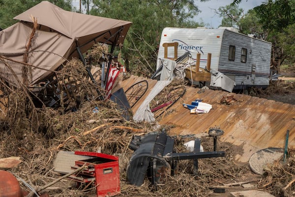 Debris from flash flooding is seen at Cedar Stays RV Park in Marble Falls, Texas, Monday, July 7, 2025. (Mikala Compton /Austin American-Statesman via AP)
