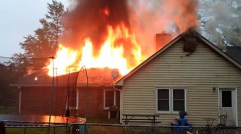 A home in Lawrenceville suffered severe damage after a lightning strike set it on fire
