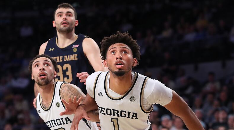 Georgia Tech guard Jose Alvarado (left) and forward James Banks III look to rebound against Notre Dame during the second half of a NCAA college basketball game on Wednesday, January 15, 2020, in Atlanta.    Curtis Compton ccompton@ajc.com
