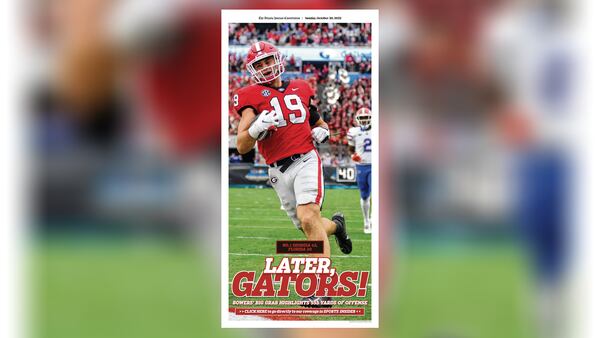 Poster page from Saturday's Georgia-Florida game in The Atlanta Journal-Constitution ePaper.