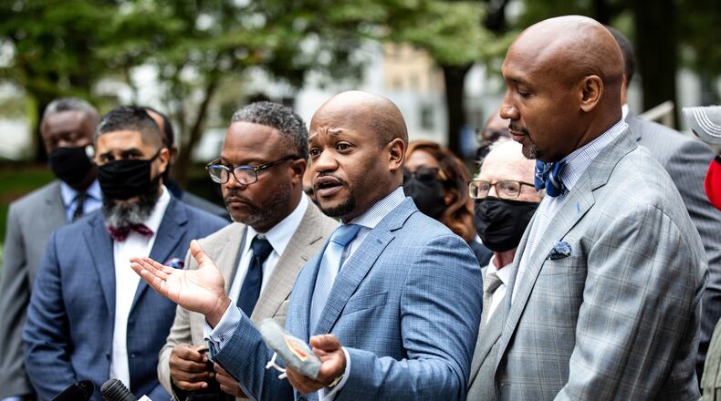 L. Chris Stewart, who represents the familie of Rayshard Brooks talks at a press conference called by nearly two dozen attorneys who are currently suing the city of Atlanta on behalf of victims of police brutality on the steps of City Hall Monday, October 26, 2020. STEVE SCHAEFER / SPECIAL TO THE AJC