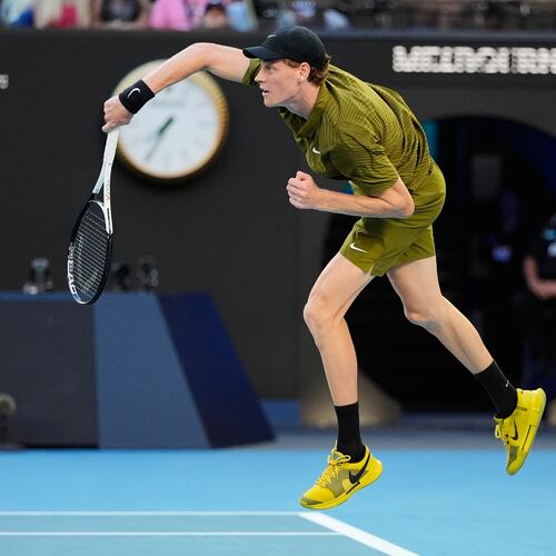 Jannik Sinner of Italy serves to Hugo Gaston of France during their first round match at the Australian Open tennis championship in Melbourne, Australia, Tuesday, Jan. 20, 2026. (AP Photo/Asanka Brendon Ratnayake)