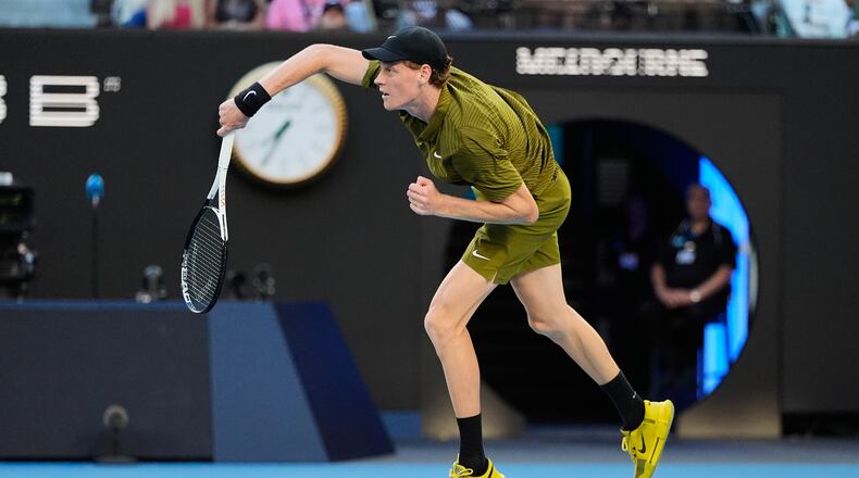 Jannik Sinner of Italy serves to Hugo Gaston of France during their first round match at the Australian Open tennis championship in Melbourne, Australia, Tuesday, Jan. 20, 2026. (AP Photo/Asanka Brendon Ratnayake)