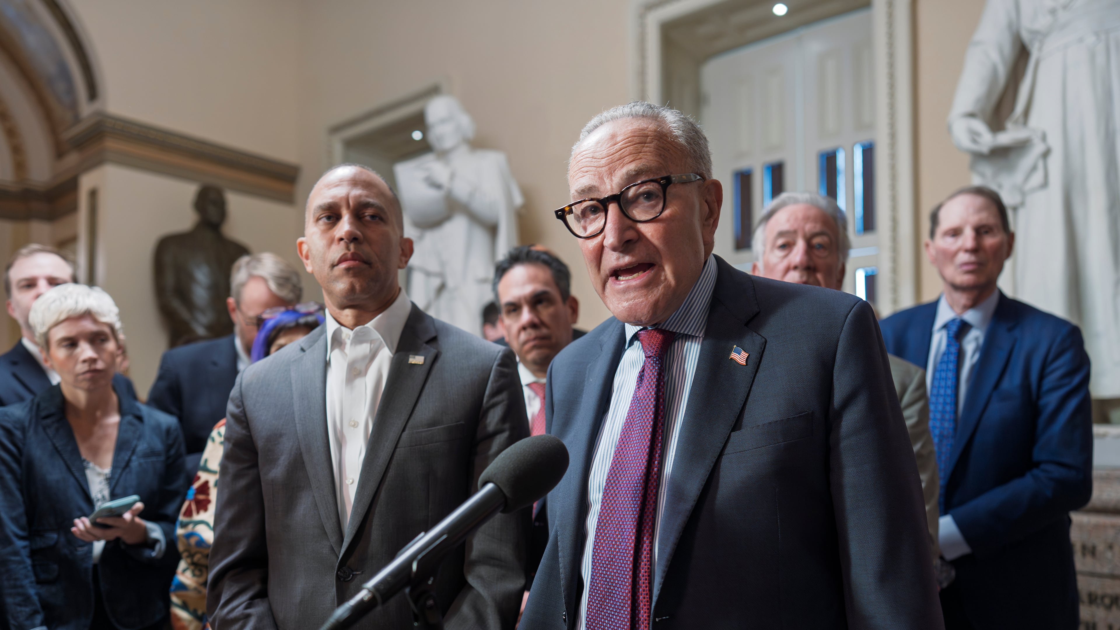 FILE—House Minority Leader Hakeem Jeffries, D-N.Y., left, and Senate Minority Leader Chuck Schumer, D-N.Y., speak to reporters at the Capitol in Washington, Thursday, Sept. 11, 2025. The Democratic leaders are lashing out at a short-term spending GOP bill to avoid a partial government shutdown at the end of the month, warning Republicans they will not support a measure that doesn't address their concerns on the soaring cost of health insurance coverage for millions of Americans. (AP Photo/J. Scott Applewhite, File)