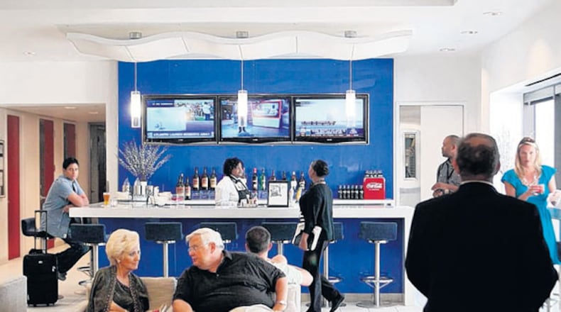 Travelers get in some downtime in the renovated Delta Sky Club in Concourse B. This is what customers can expect for the Concourse A Sky Club, except the A17 one will be larger.