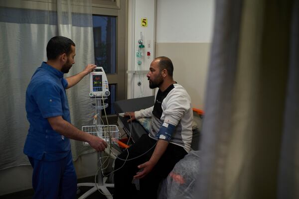 Hamdan Ballal, Oscar-winning Palestinian co-director of "No Other Land," is checked at a hospital in Hebron, a day after being detained by the Israeli army following an attack by Jewish settlers in the village of Susiya in Masafer Yatta, Tuesday, March 25, 2025. (AP Photo/Leo Correa)