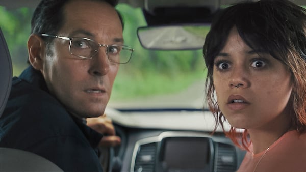 This image released by A24 shows Paul Rudd, left, and Jenna Ortega in a scene from "Death of a Unicorn." (A24 via AP)