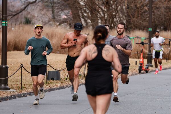 The unseasonably warm weather drew people outside and to the Atlanta Beltline on Saturday. (Natrice Miller/AJC)