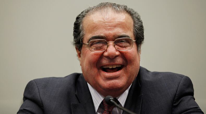 WASHINGTON - MAY 20: U.S. Supreme Court Associate Justice Antonin Scalia testifies before the House Judiciary Committee's Commercial and Administrative Law Subcommittee on Capitol Hill May 20, 2010 in Washington, DC. Scalia and fellow Associate Justice Stephen Breyer testified to the subcommittee about the Administrative Conference of the United States. (Photo by Chip Somodevilla/Getty Images)