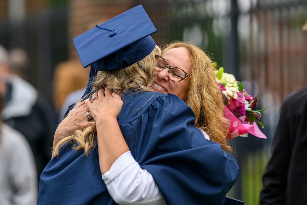 Berry College graduate Kara Schmit gets a hug from her mom, Sue Schmit, Saturday, May 9, 2026. (Courtesy of Brant Sanderlin/Berry College)