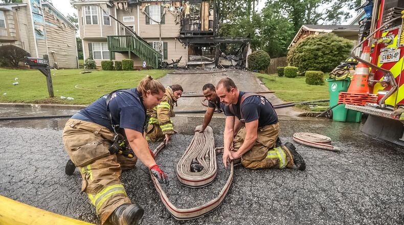 A house fire early Monday morning in Lithonia has left four people and two dogs displaced.