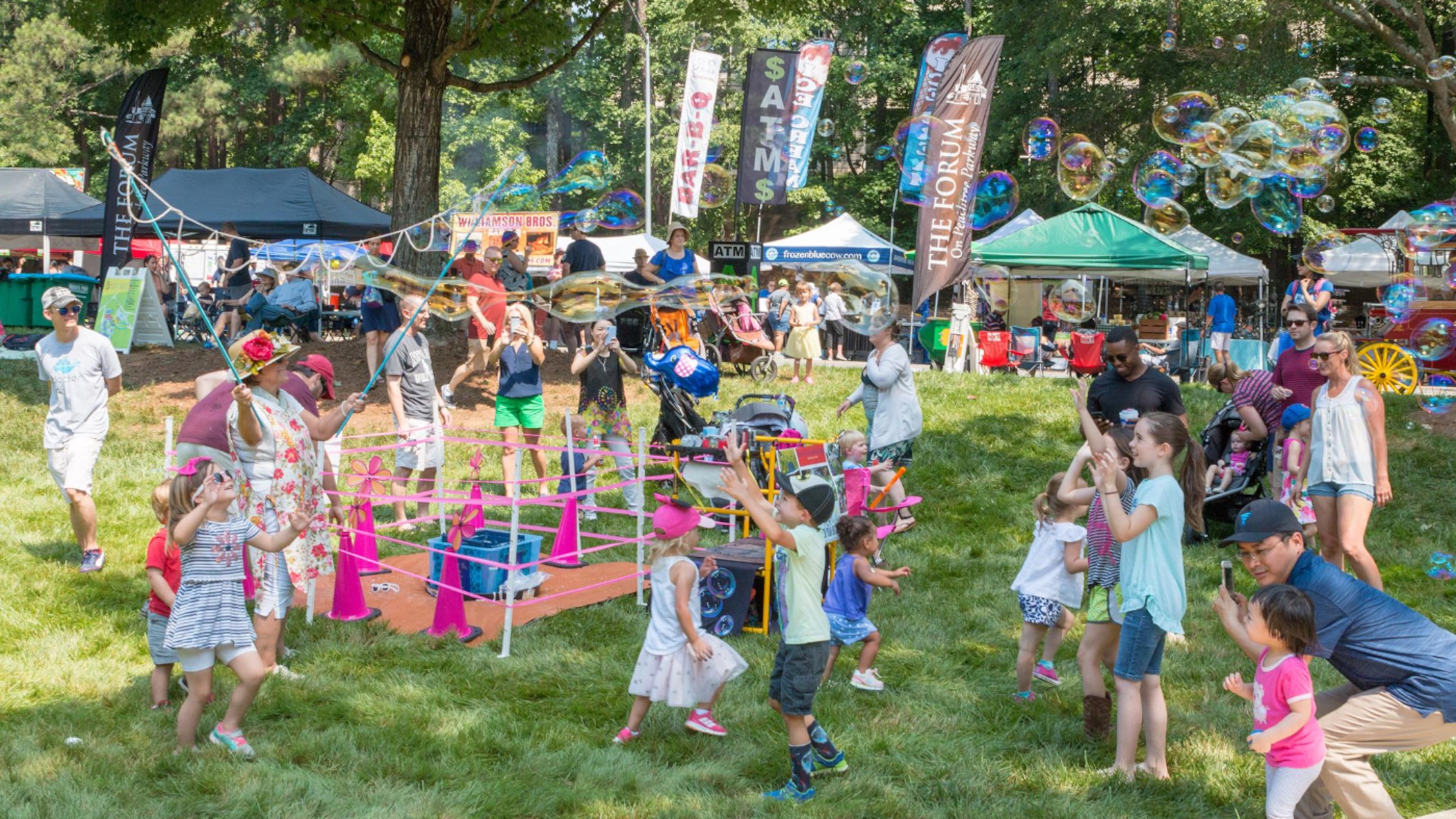 Plenty of free activities for kids are part of the Peachtree Corners Festival on Saturday and Sunday, including bubble fun, sand art and face painting. (Courtesy of Peachtree Corners Festival)